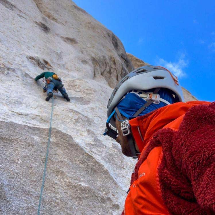 Karsten Delap using EyeSend belay glasses watching as the other rock climber goes up